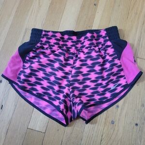 Nike pink and black workout shorts